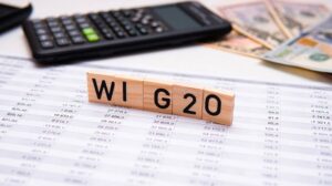 Tabela z cyframi oraz napis WIG 20 jako symbol akcji giełdowych z GPW